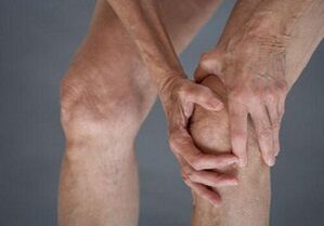 ara -masage ti orokun pẹlu arthrosis